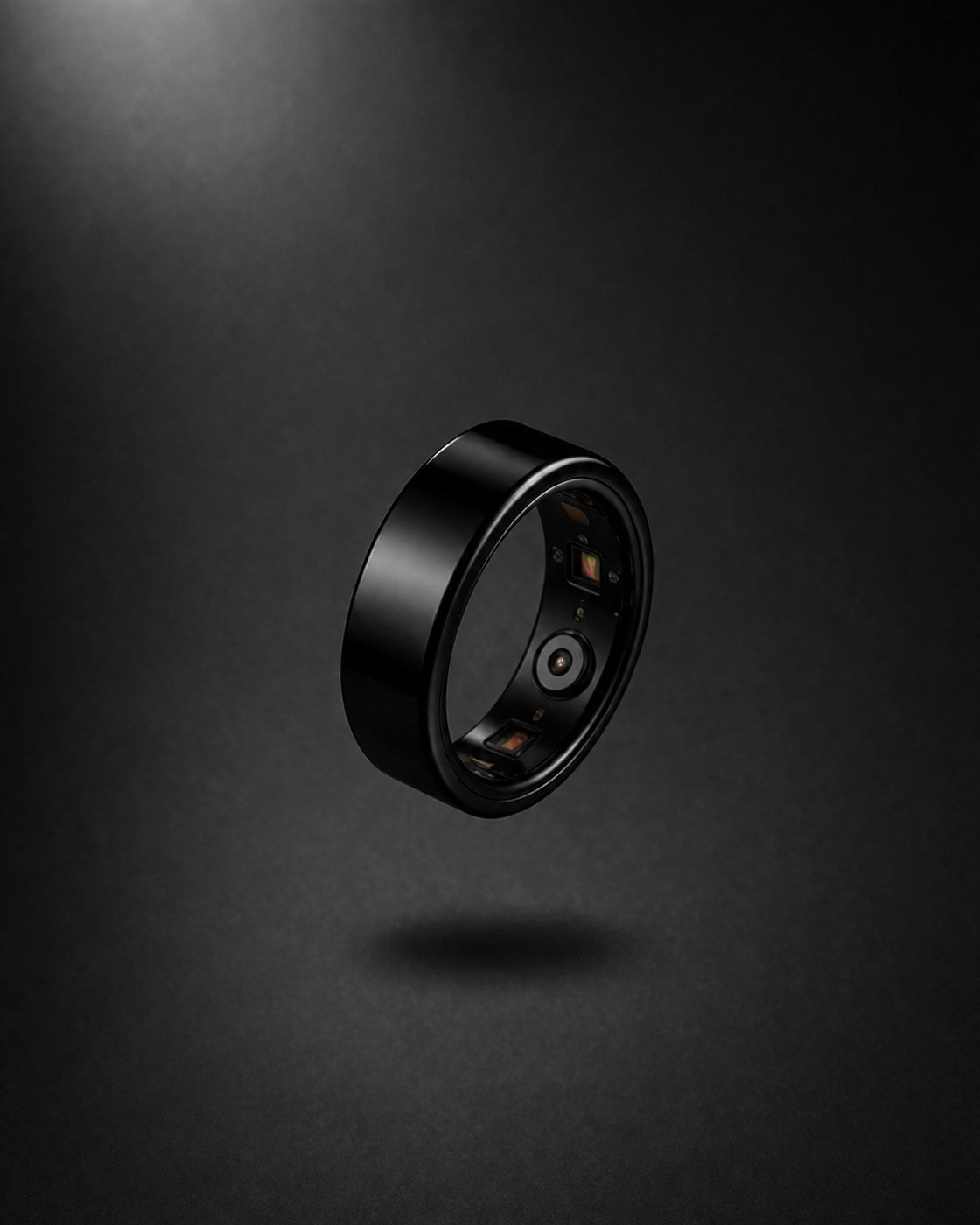 Kayza PRO black smart ring showing the inner heart rate sensor array