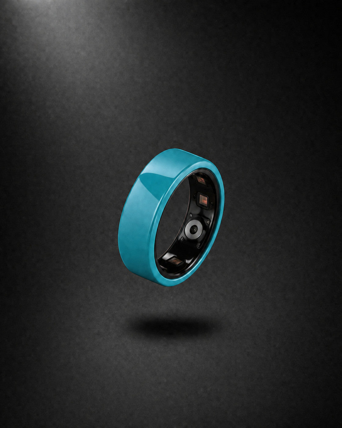 Kayza PRO teal smart ring showing the inner heart rate sensor array